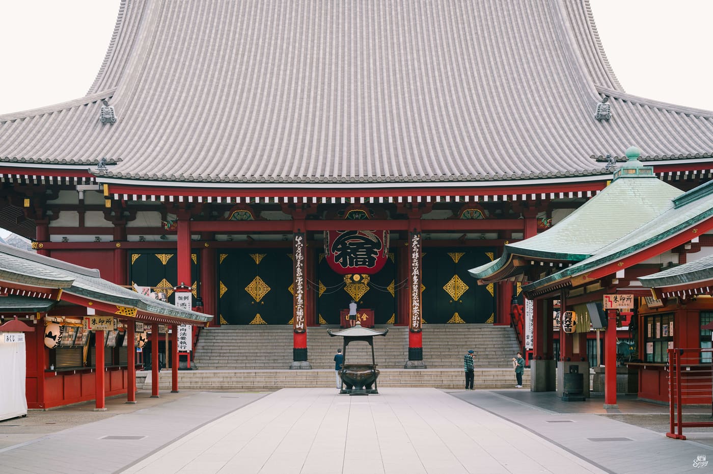 The main hall of Senso-ji in Asakusa with its courtyard almost empty in early morning