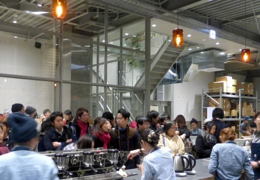 Customers packing the lofty roastery cafe of Blue Bottle Coffee Kiyosumi on opening week