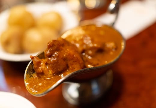 European-style beef curry served in a silver gravy boat at Curry Bondy, Jimbocho