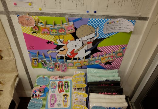Illustrations and handmade goods on display in a rental booth at Design Festa Gallery