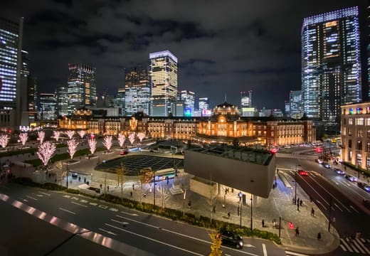 Tokyo Station Marunouchi building lit at night seen from the KITTE rooftop garden