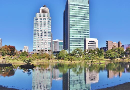 Hamamatsucho towers reflected in the still pond of Kyu Shiba Rikyu Gardens