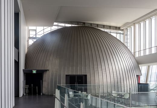 Silver sphere of the Dome Theater inside the atrium of Miraikan, Odaiba