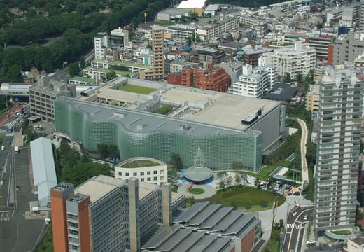 Aerial view of the undulating National Art Center Tokyo among Roppongi buildings