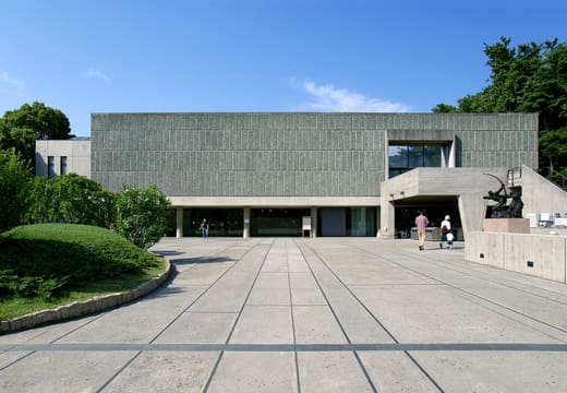 Stone-paved forecourt and low Le Corbusier facade of the National Museum of Western Art, Ueno