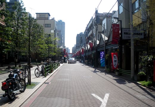 Tsukishima Nishinaka-dori monja street lined with restaurants in daylight