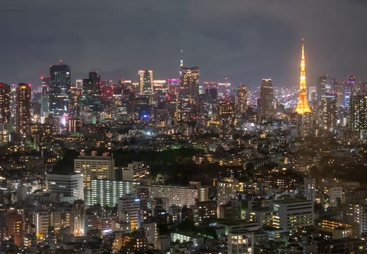 Night view of Tokyo Tower from the top floors of Yebisu Garden Place Tower