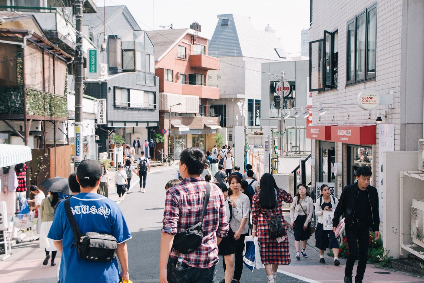Shoppers walking the boutique-lined Cat Street between Shibuya and Harajuku