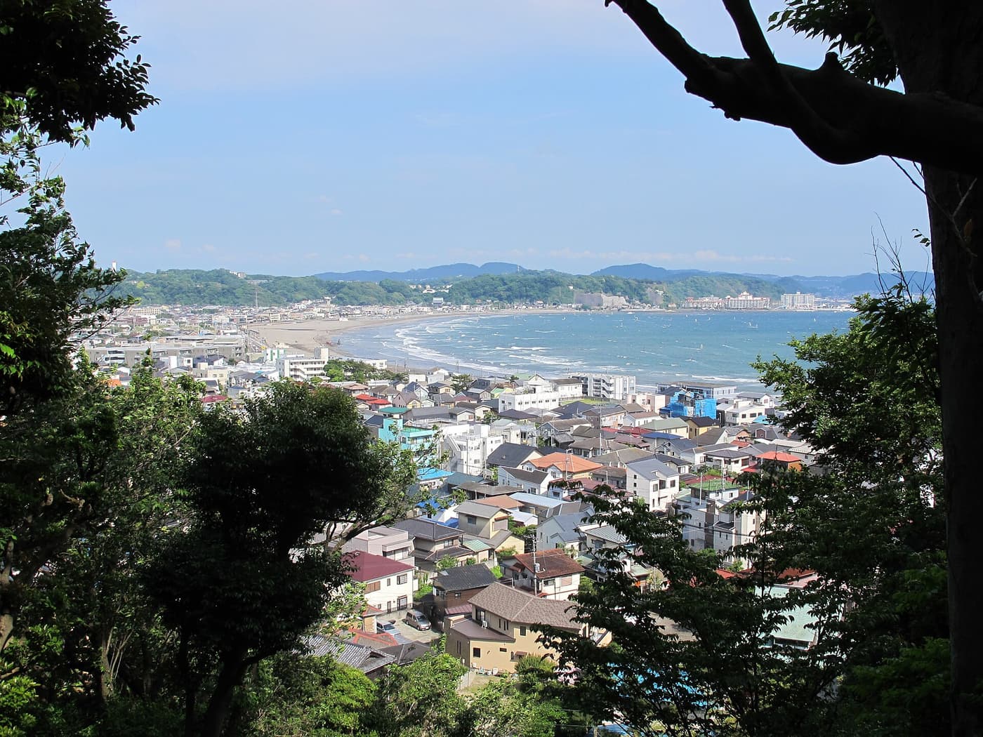 View over Kamakura rooftops to Yuigahama beach and Sagami Bay from Hase-dera
