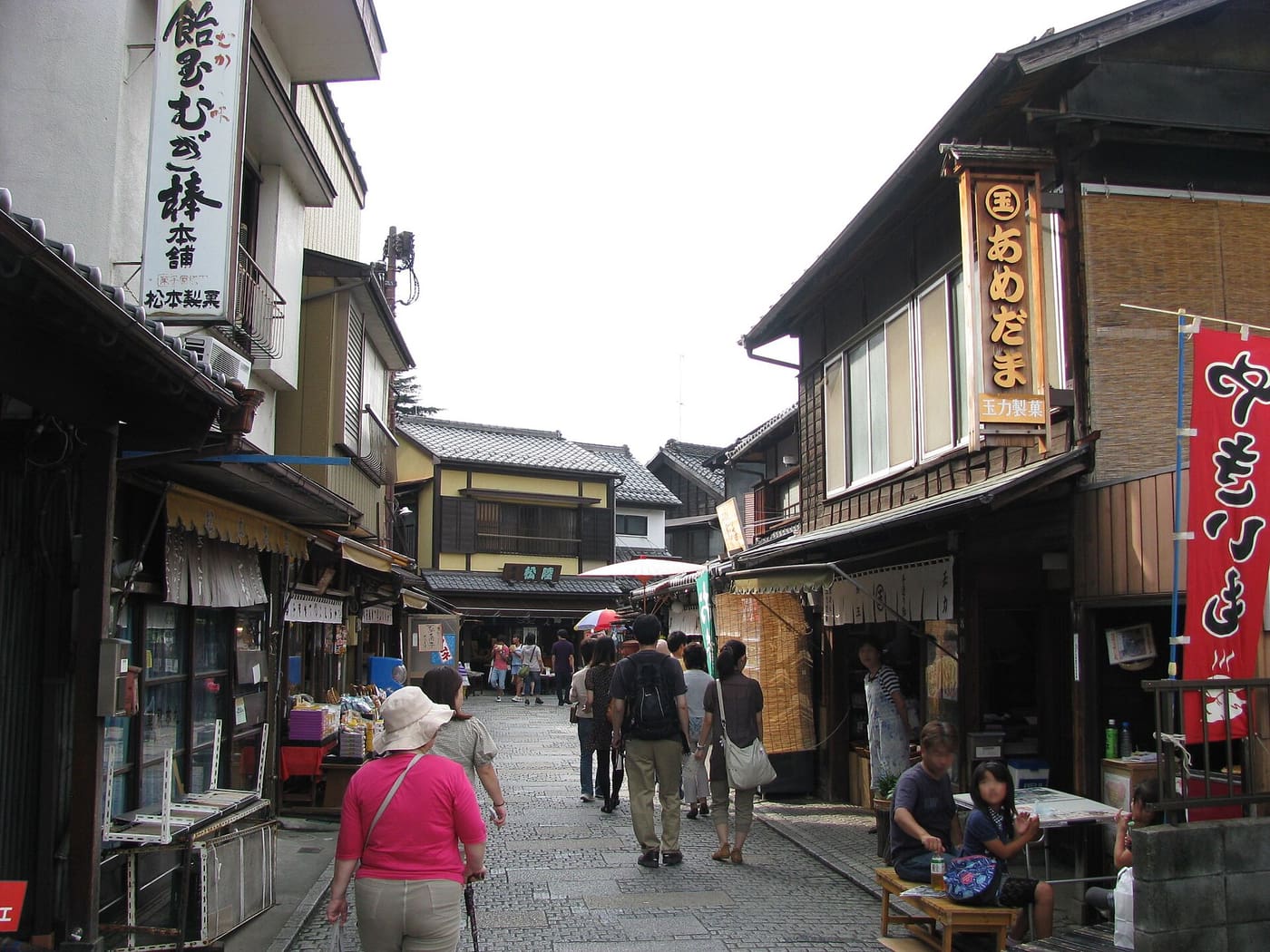 Old sweet shops lining the cobbled Kashiya Yokocho candy alley in Kawagoe