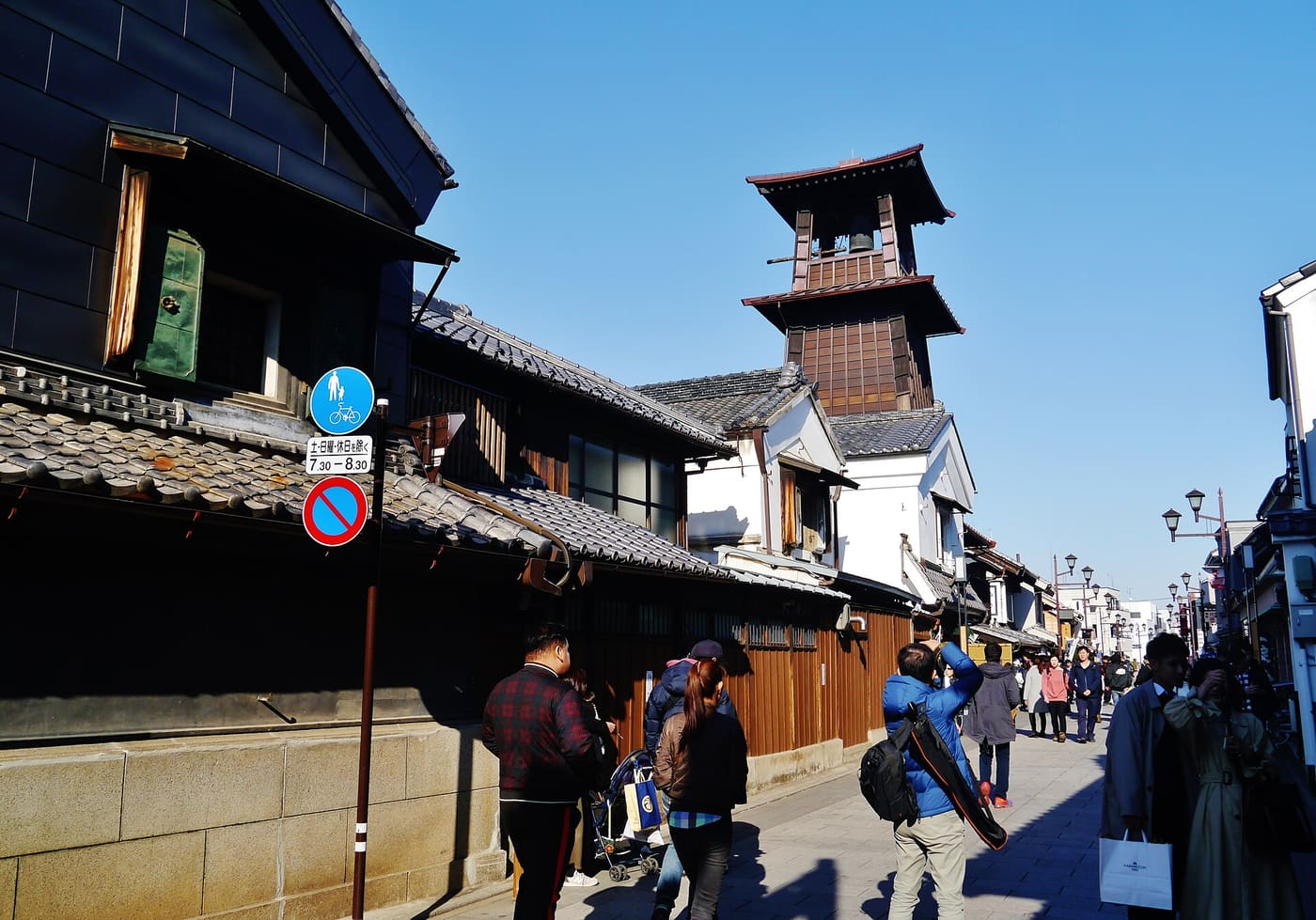 Visitors on the warehouse street of Kawagoe below the Toki no Kane bell tower