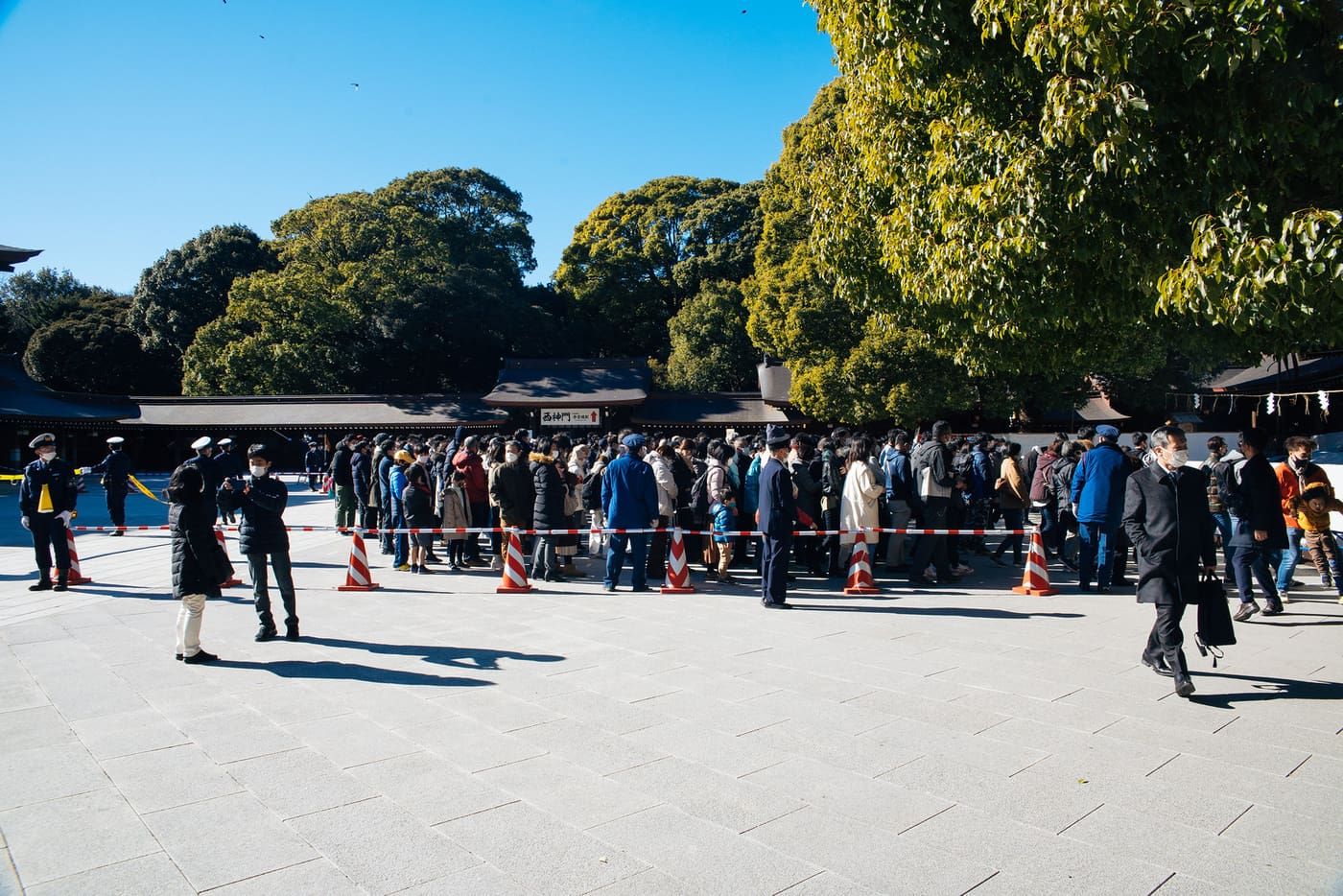 Visitors lining up in the Meiji Shrine courtyard on the first days of January