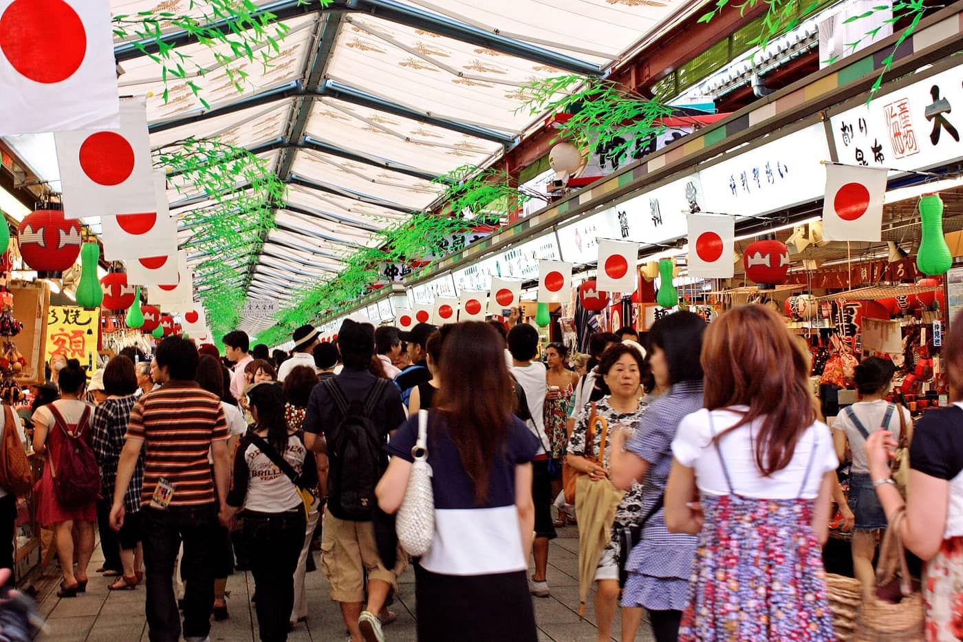 Crowds under the lanterns of Nakamise-dori on the way to Senso-ji, Asakusa