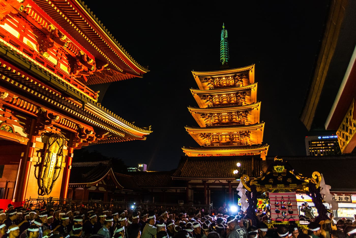 Senso-ji and its five-storey pagoda lit up at night on Sanja Matsuri weekend
