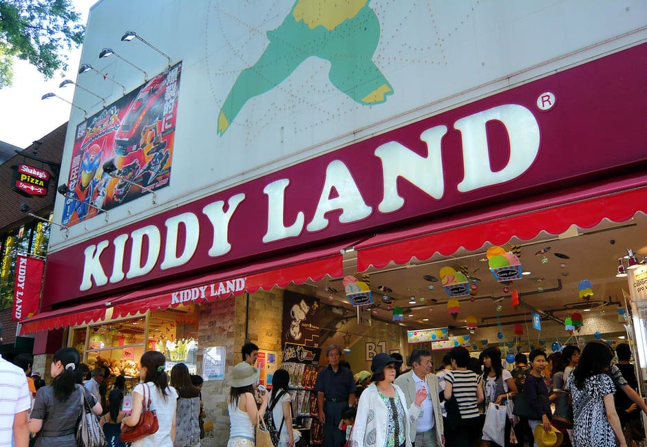 Crowds at the Kiddy Land toy store entrance under its red sign on Omotesando, Harajuku
