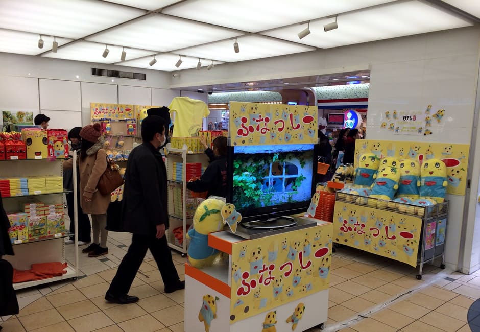 Funassyi character shop with plush toys and a game display on Tokyo Character Street