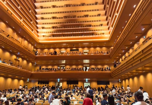 Tall pyramid ceiling and wooden balconies of the Tokyo Opera City Concert Hall